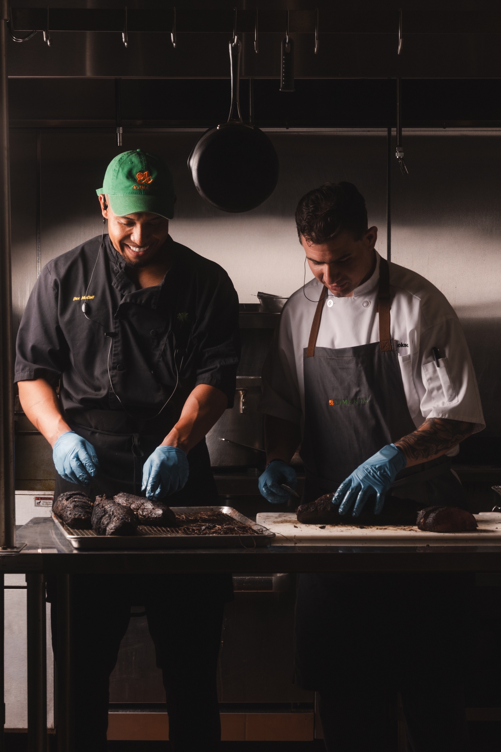 Two chefs working together in a restaurant kitchen