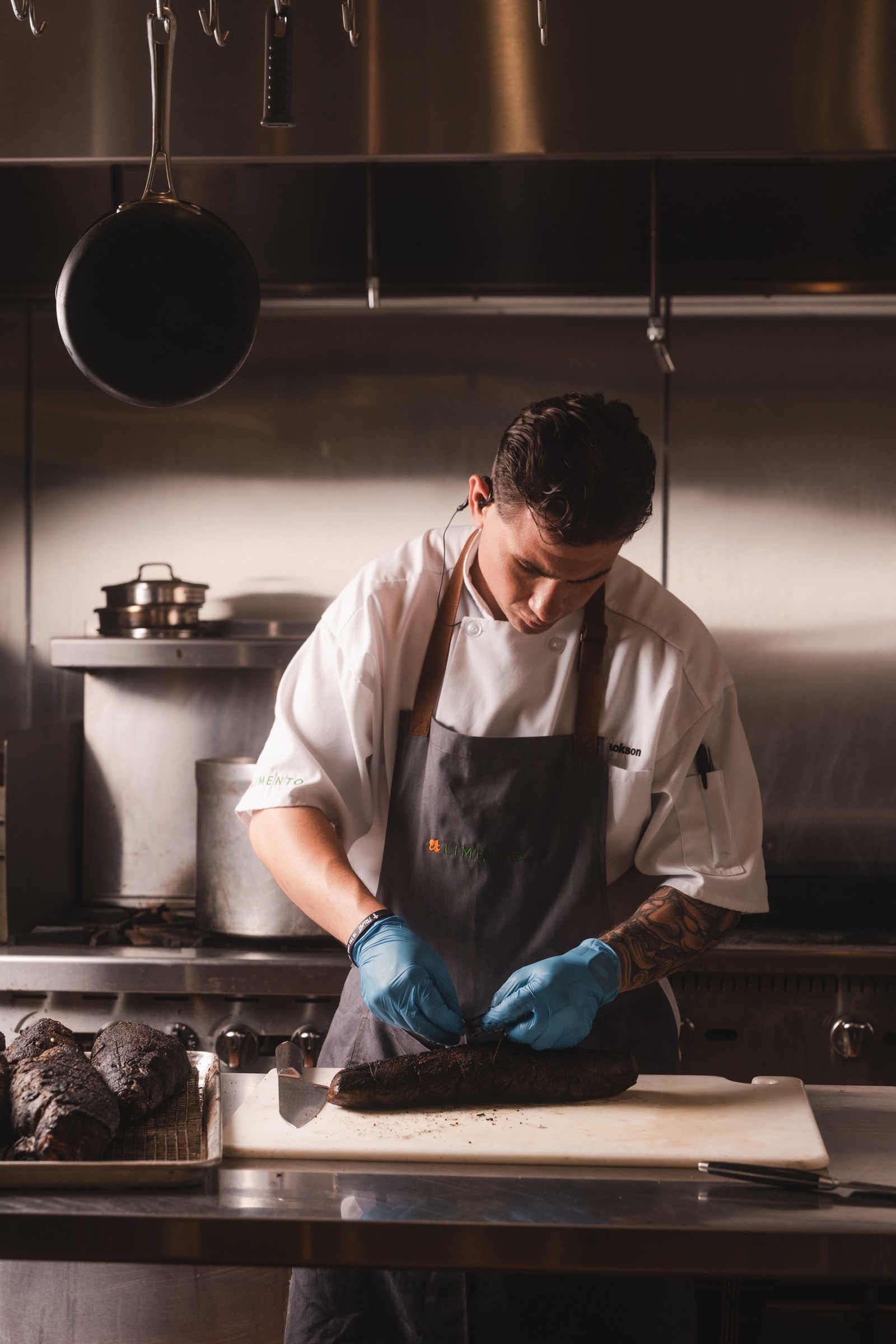 Chef preparing food during service in a restaurant kitchen
